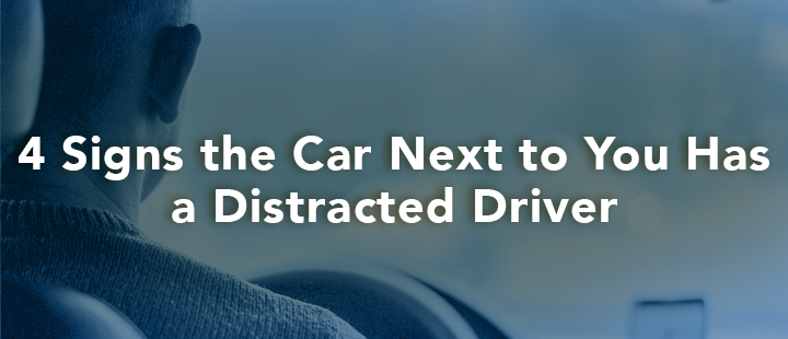 blog header 4 signs the car next to you has distracted driver