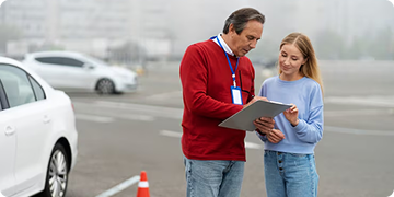driver instructor working with student